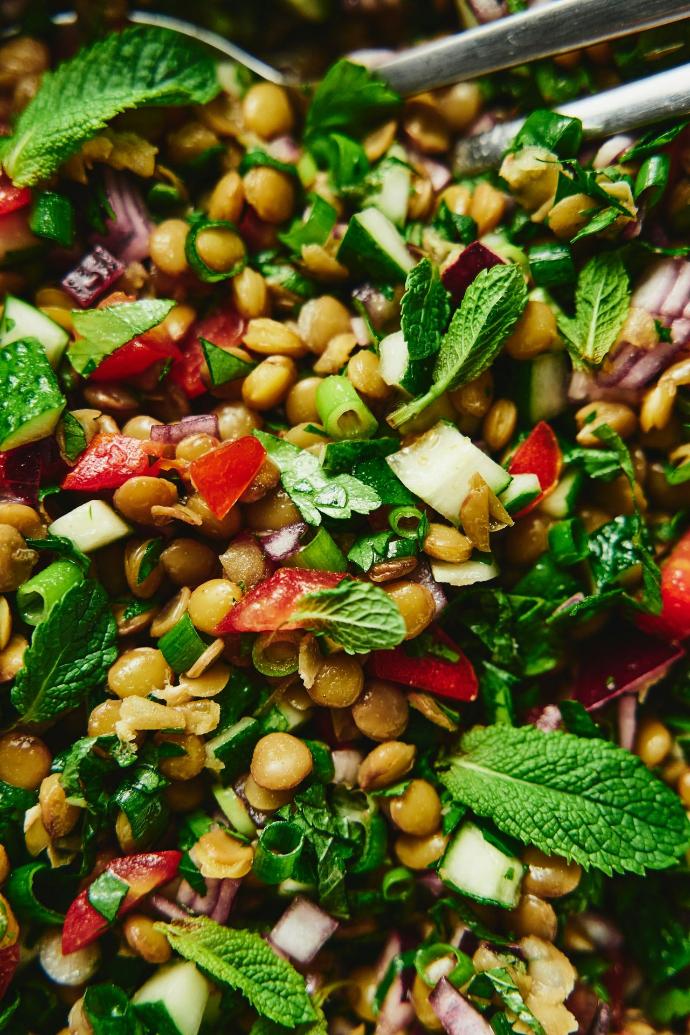 a close up of a plate of food with a spoon